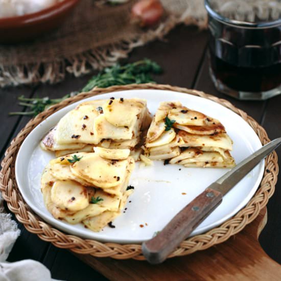Crispy Potato Cake w/ Garlic & Thyme - Recipe photo by foolproofliving.com