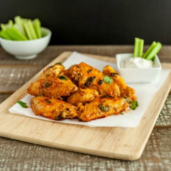 Saucy Baked Buffalo Chicken Wings - Recipe photo by beautyandthefoodie