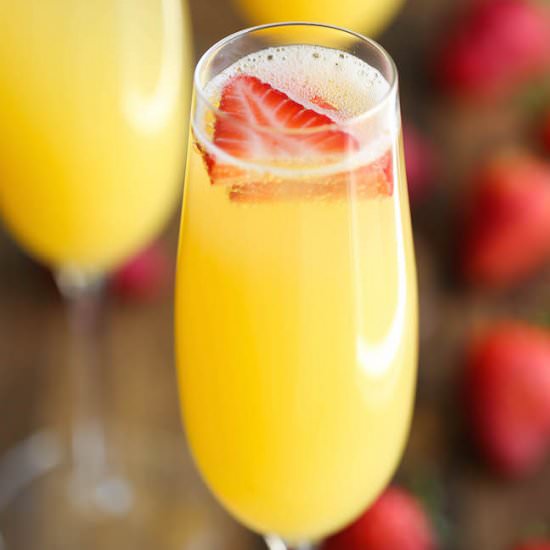 Strawberry Pineapple Mimosas - Recipe photo by damndelicious