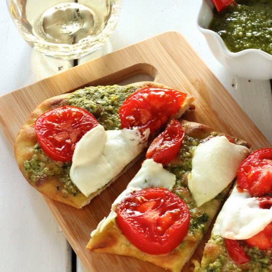Grilled Pesto Tomato Flatbread - Recipe photo by Craving Something Healthy
