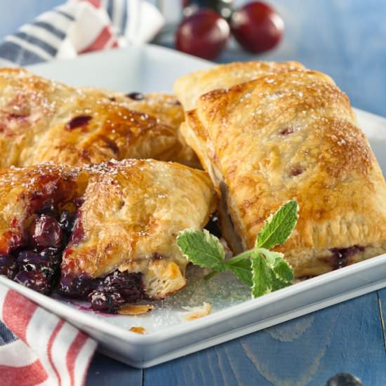 Triple Berry Hand Pies - Recipe photo by What A Girl Eats