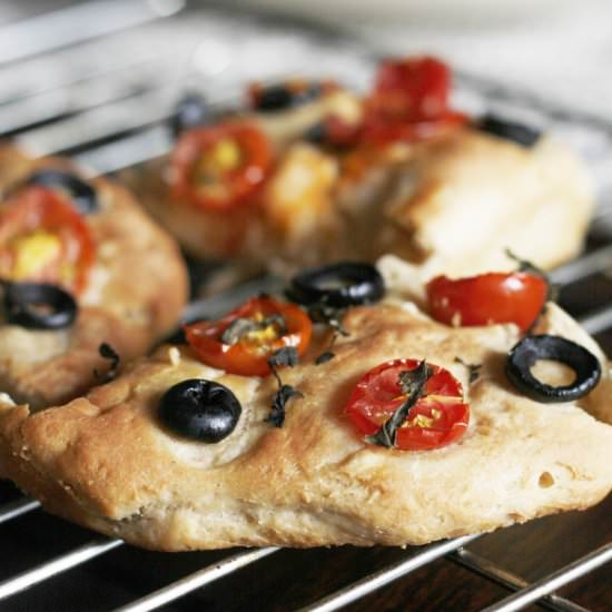 Olive and cherry tomato focaccia - Recipe photo by Enzo the Baker