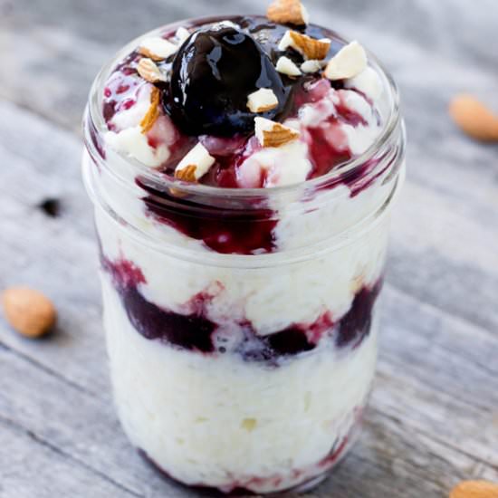 Rice Pudding with Warm Cherry Sauce - Recipe photo by eatthriveglow