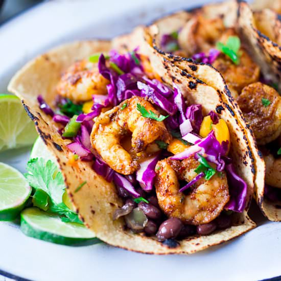 Caribbean shrimp tacos - Recipe photo by Feasting at Home