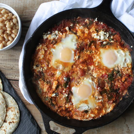 Shakshuka w/ Braised Mustard Greens - Recipe photo by chasetheflavors