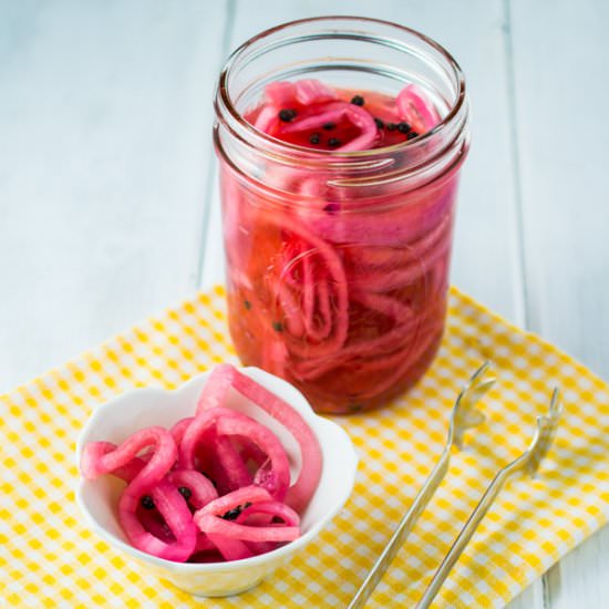 Paleo Friendly Pickled Red Onions - Recipe photo by awholenewtwist.com
