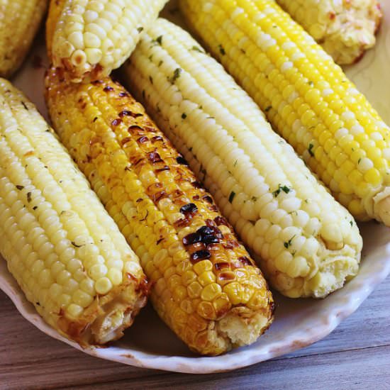Herb and Parmesan Grilled Corn - Recipe photo by syrupandbiscuits