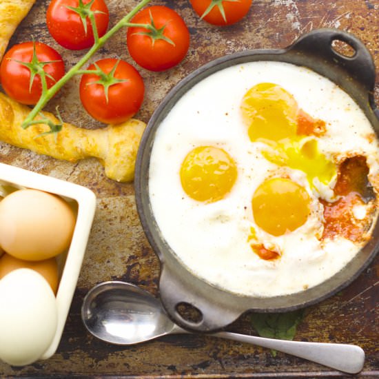 Baked Eggs With Cheese & Tomato - Recipe photo by tiffanybendayan