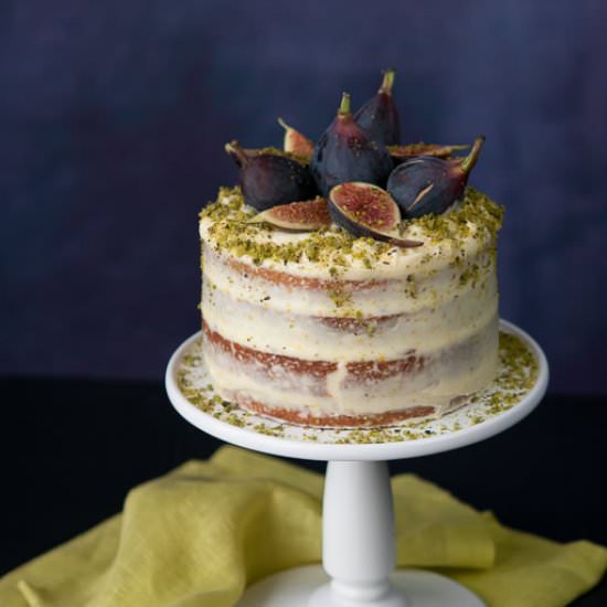 Fig Pistachio Cake with Orange Frosting - Recipe photo by hungryrabbitnyc