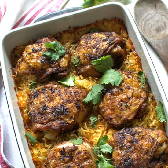 Chicken baked over rice - Recipe photo by zielonysrodek