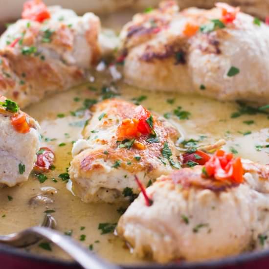 Garlic and Cheese Stuffed Chicken - Recipe photo by Girl and the Kitchen