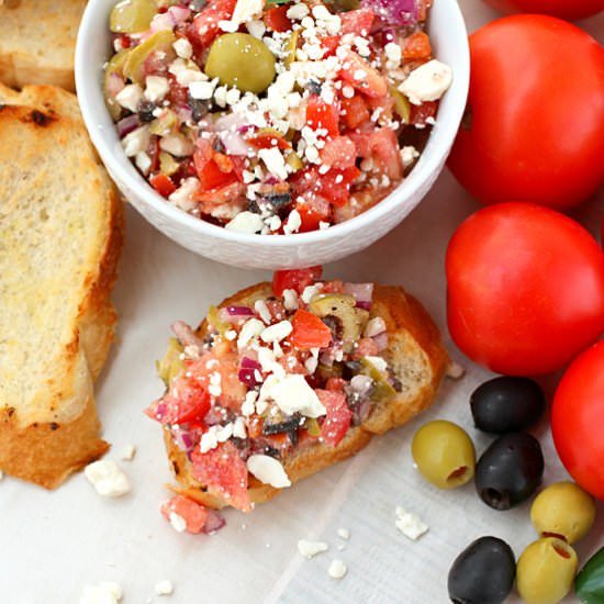 Greek Tomato and Feta Bruschetta - Recipe photo by Kitchen Simmer