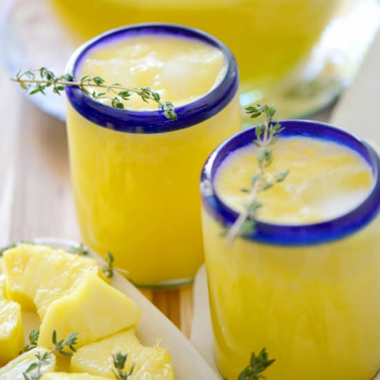Pineapple Thyme Agua Fresca - Recipe photo by NibblesNFeasts