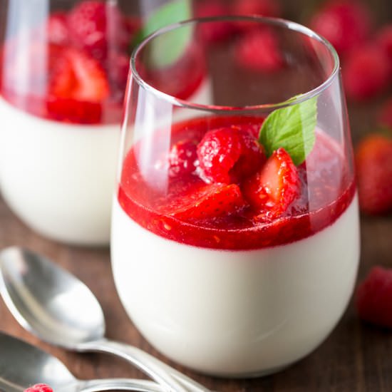 Panna Cotta with Berry Sauce - Recipe photo by NatashasKitchen.com