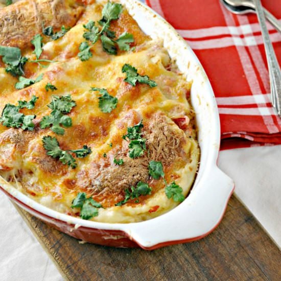 White Chicken Enchiladas - Recipe photo by loavesanddishes