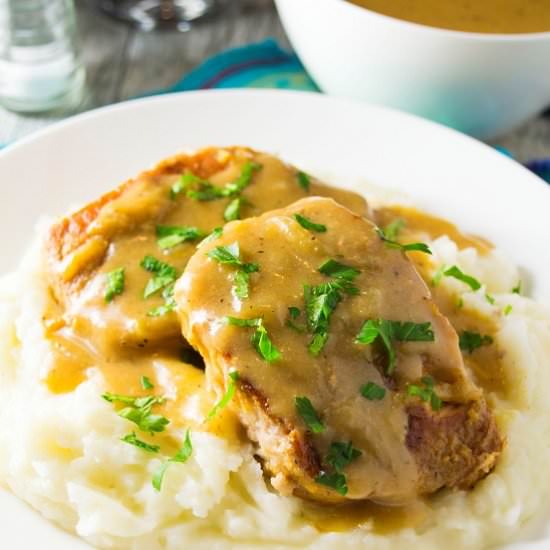 Smothered Slow Cooker Pork Chops - Recipe photo by AWickedWhisk