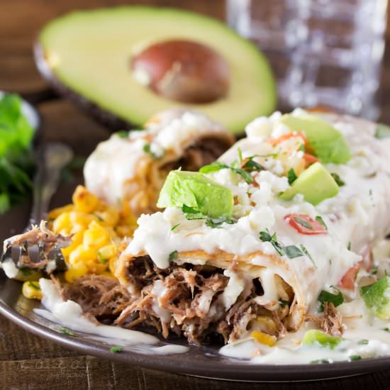 Smothered Barbacoa Chimichangas - Recipe photo by The Chunky Chef