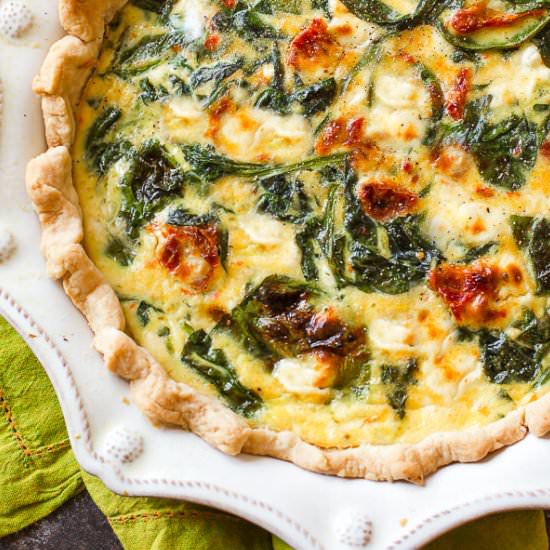 Goat Cheese and Sun Dried Tomato Quiche - Recipe photo by sallysbakingaddiction