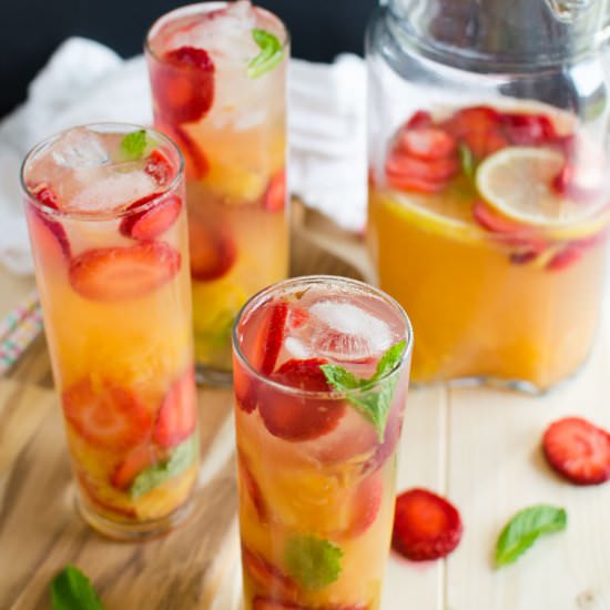 Pineapple and Strawberry Sangria - Recipe photo by watchwhatueat