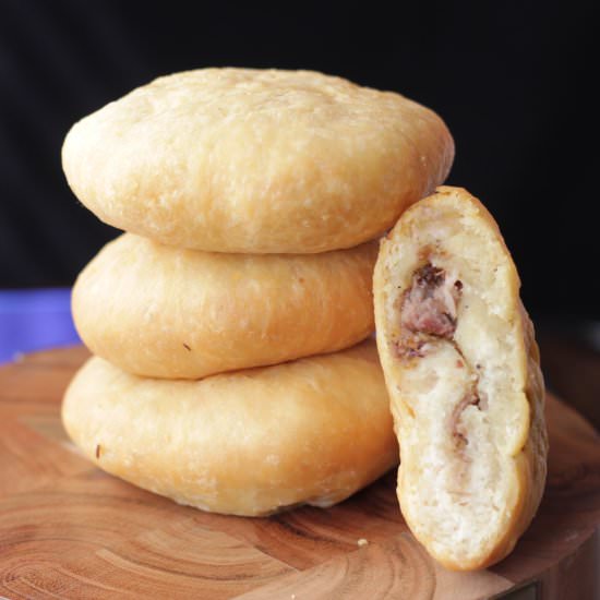 Jerk Pork Stuffed Bakes - Recipe photo by tastesspicy