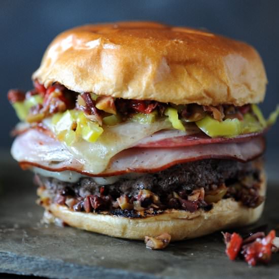 Muffaletta Burger - Recipe photo by girlscangrill