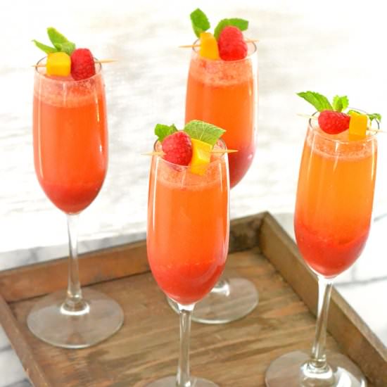 Raspberry Mango Bellinis - Recipe photo by loveandfoodforeva