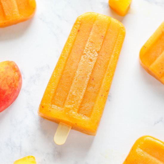 Fresh Peach Mango Popsicles - Recipe photo by Purely Katie