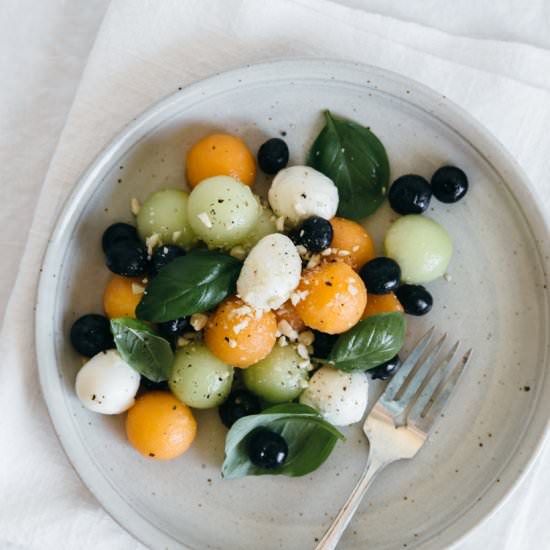 Melon Mozzarella Salad with Basil - Recipe photo by Downshiftology