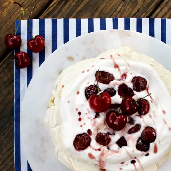 Pavlova with Bourbon Cherry Sauce - Recipe photo by tagandtibby