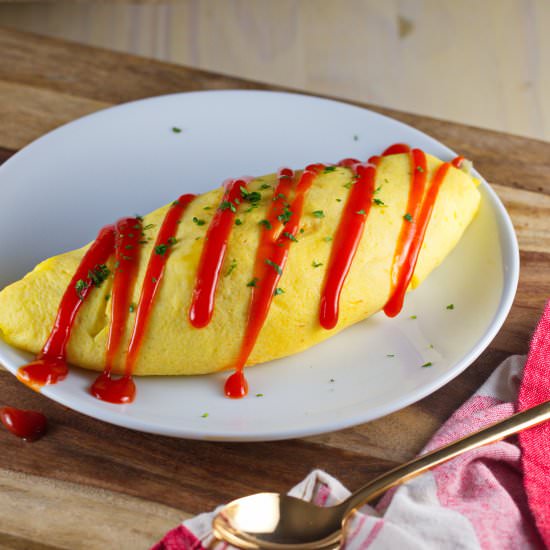 OMURICE: Omelette over ketchup rice - Recipe photo by ricewitheverything