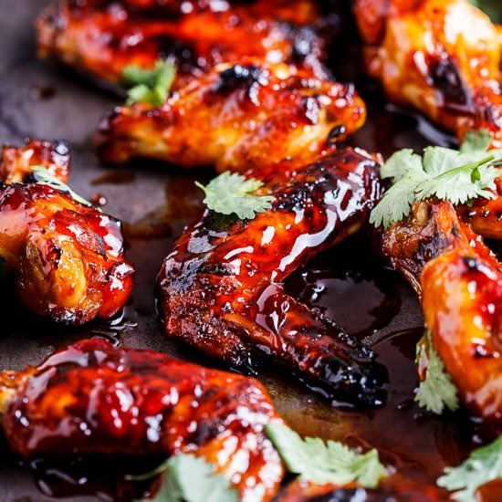 Sticky sriracha-honey chicken wings - Recipe photo by Simply Delicious
