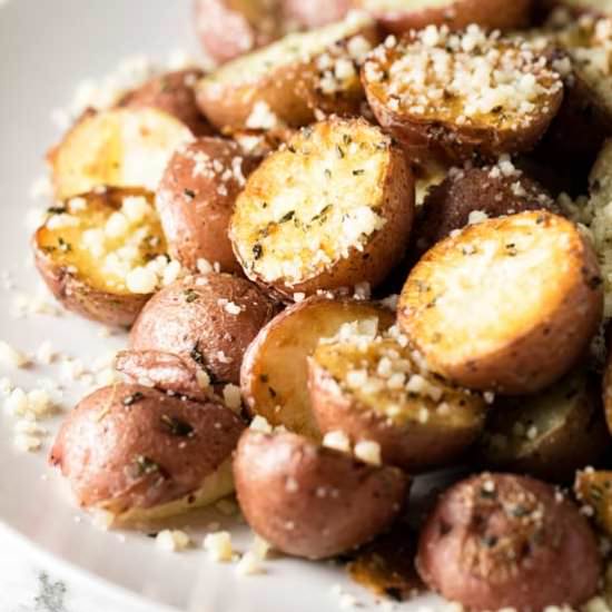 Roasted Parmesan Potatoes - Recipe photo by Girl Gone Gourmet