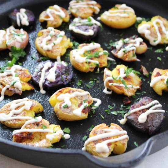 Smashed potatoes with vegan aioli - Recipe photo by cocoaandsalt