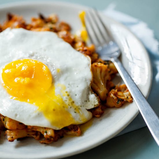 Cauliflower Hash With Eggs - Recipe photo by PaleoLeap
