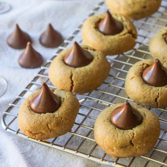 Gluten Free Peanut Butter Blossoms - Recipe photo by asaucykitchen