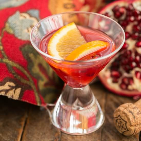Pomegranate Champagne Cocktail - Recipe photo by thatskinnychickcanbake