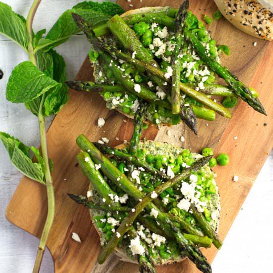 Pea + Asparagus Breakfast Bagels - Recipe photo by almondtozest.com