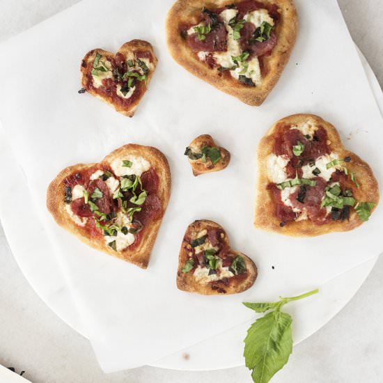 Heart Shaped "Beesting" Mini Pizzas - Recipe photo by Pretty in Pistachio