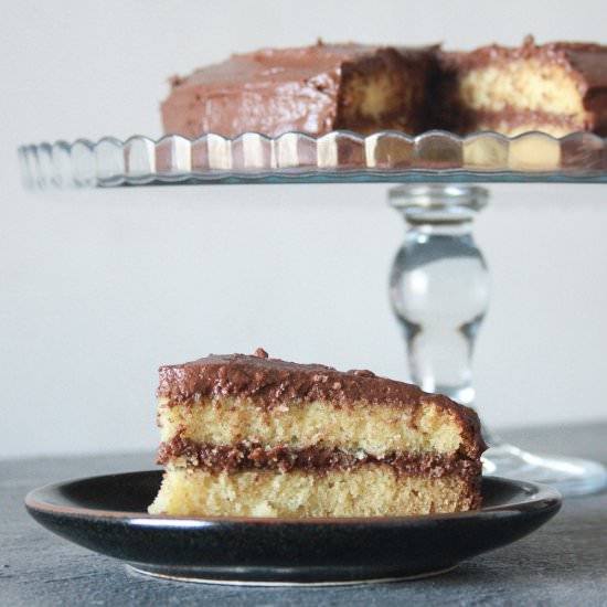 Yellow Cake with Fudge Frosting - Recipe photo by The Desserted Girl