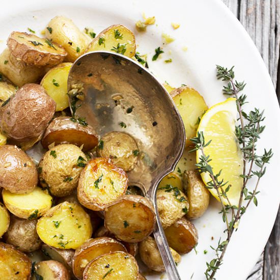 Garlic and Lemon Roasted Potatoes - Recipe photo by seasonsandsuppers