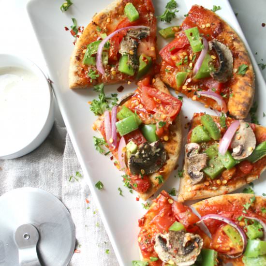 Vegan Veggie Pita Pizzas - Recipe photo by This Savory Vegan