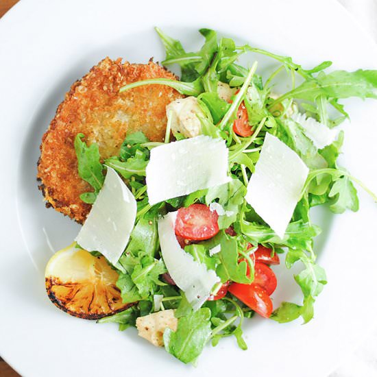 Pork Milanese with Arugula Salad - Recipe photo by white plate blank slate
