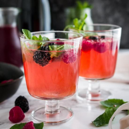 Sparkling Berry Champagne Cocktail - Recipe photo by platedcravings