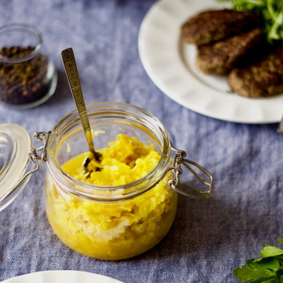Pineapple Turmeric Sauerkraut - Recipe photo by YangsNourishingKitchen
