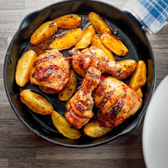 Skillet Jerk Chicken with Potatoes - Recipe photo by Brian Jones
