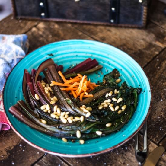 Braised Rainbow Chard w/ Pine Nuts - Recipe photo by TacoBoutFood