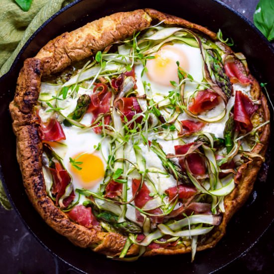 Dutch Baby Pesto Breakfast Pizza - Recipe photo by MorganHosttheToast