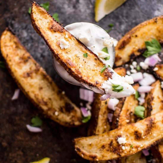 Greek Loaded Baked Potato Wedges - Recipe photo by saltandlavender