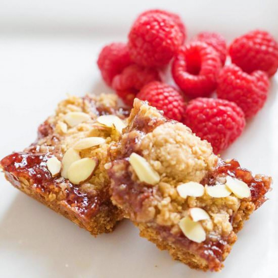 Raspberry Jam Crumb Bars - Recipe photo by livingwellspendingless