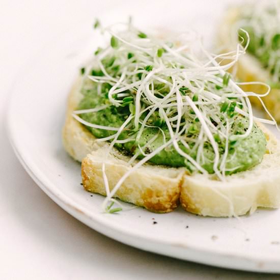 Roasted Garlic Sweet Pea Bruschetta - Recipe photo by Our Salty Kitchen